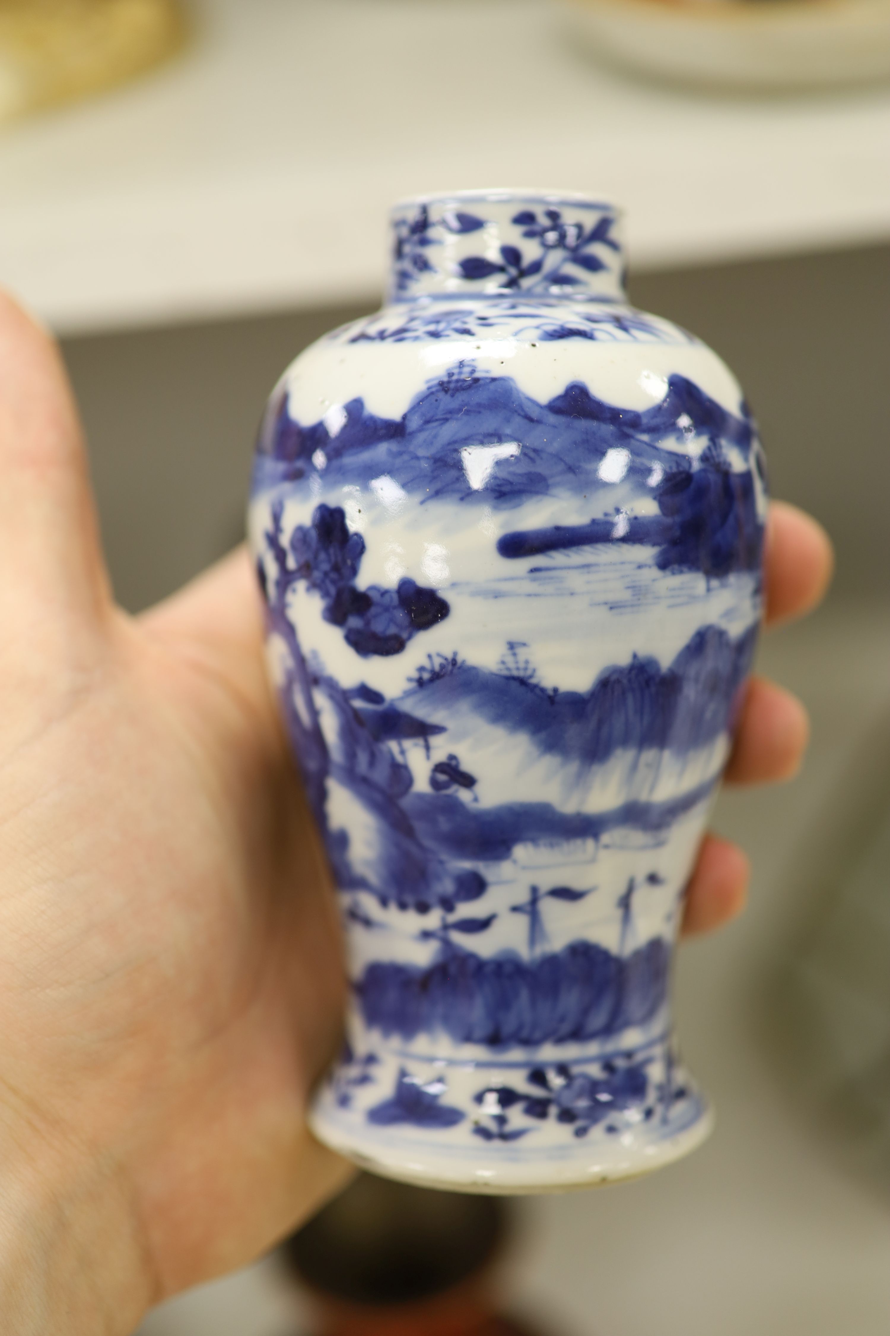 Three Chinese blue and white vases, a cloisonne enamel vase, another vase and a soapstone figure